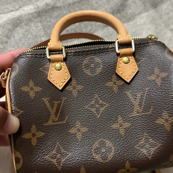 Louis Vuitton Mini Brown Monogram Bag

Speedy Nano! - Picture 8 of 10